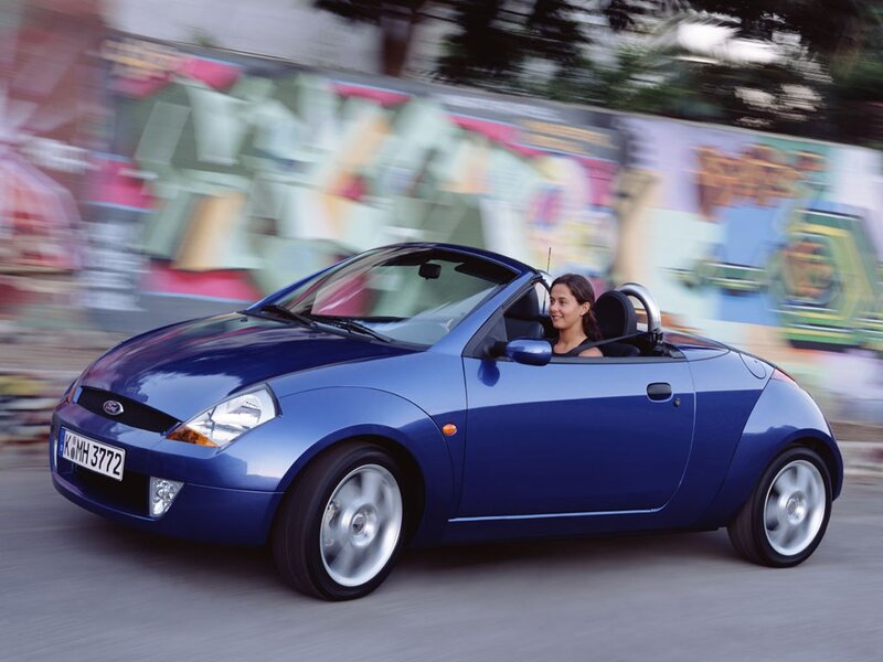 Woman Driving Blue Car