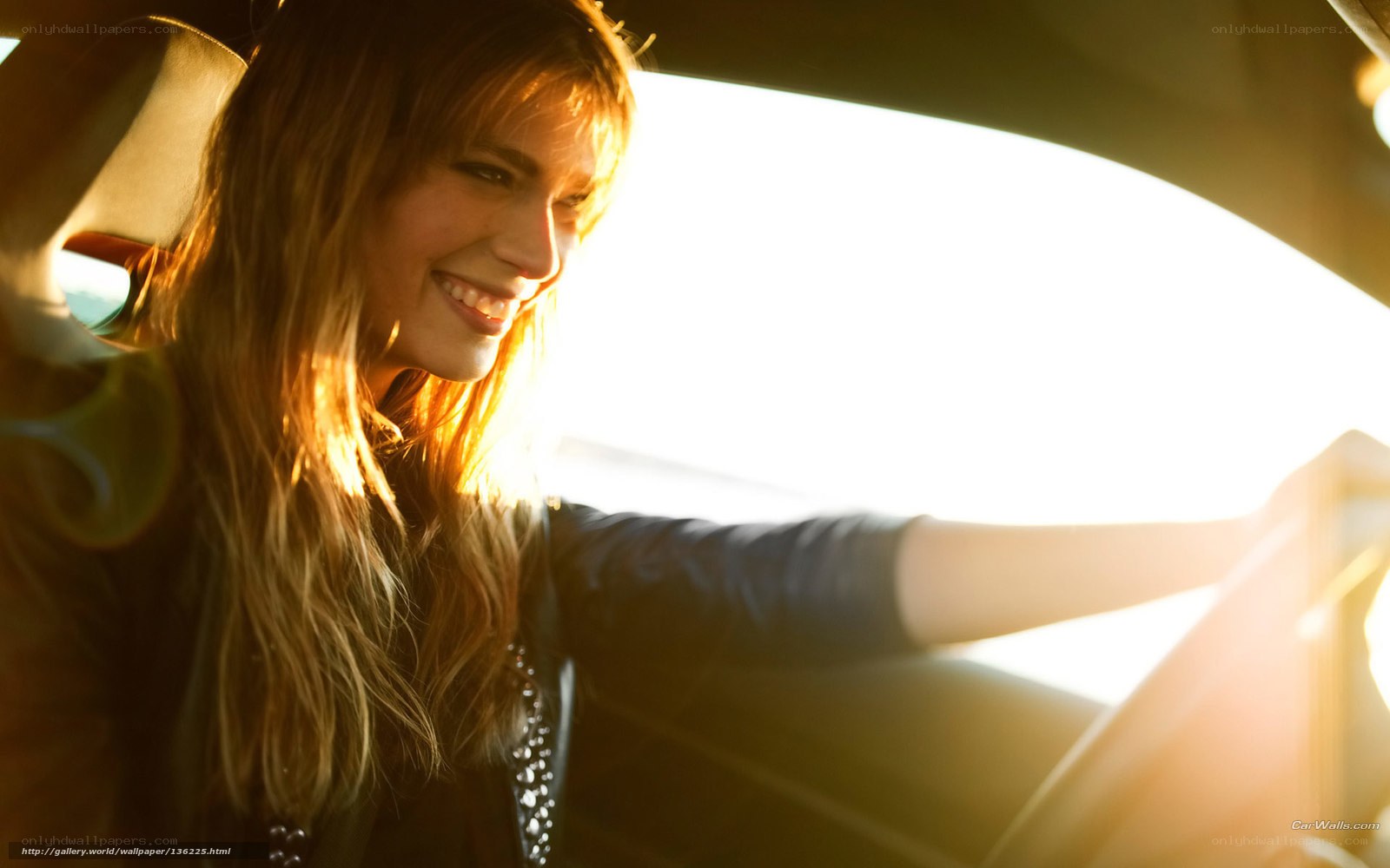 woman driving in sunlight