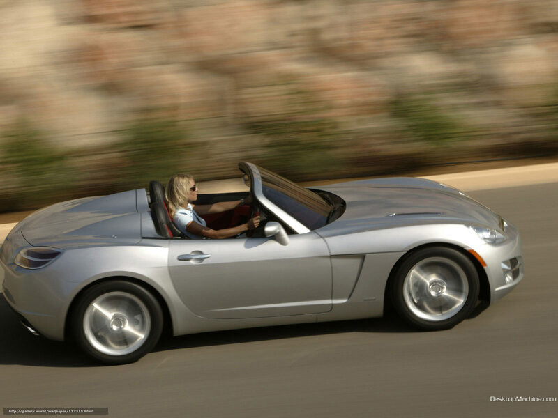 Woman Driving Silver Car