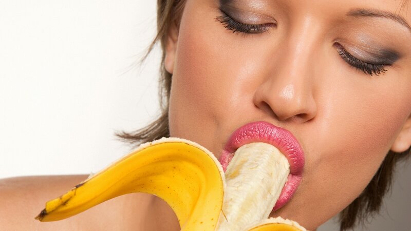 woman eating a banana