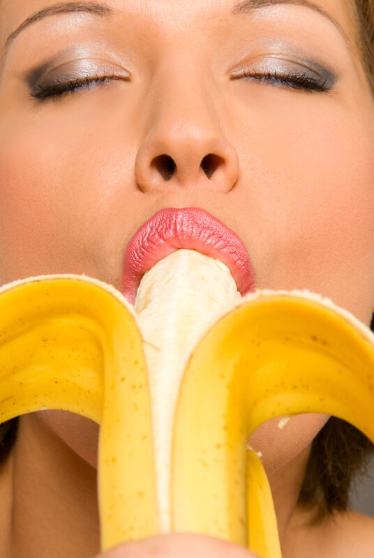 woman eating a banana