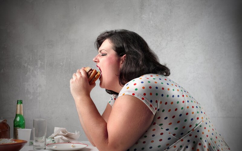 Woman eating a burger