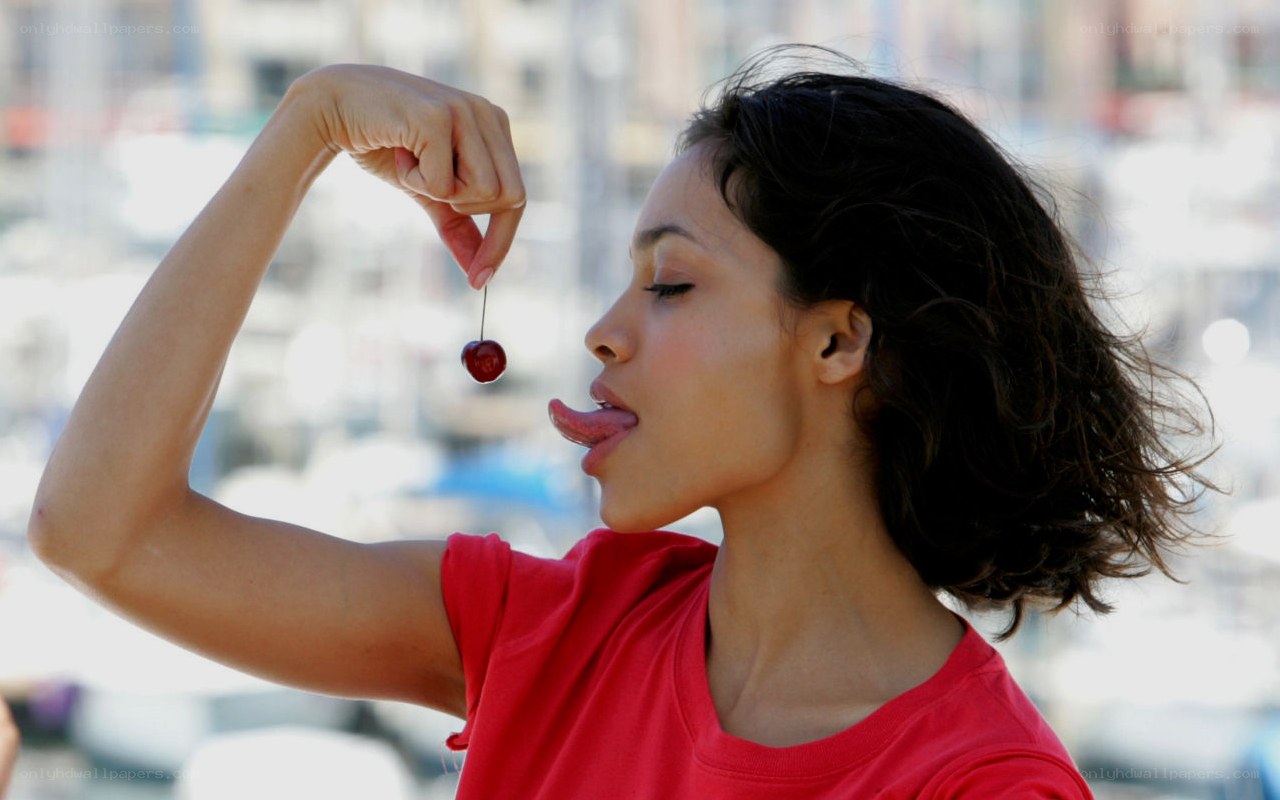 woman eating a cherry