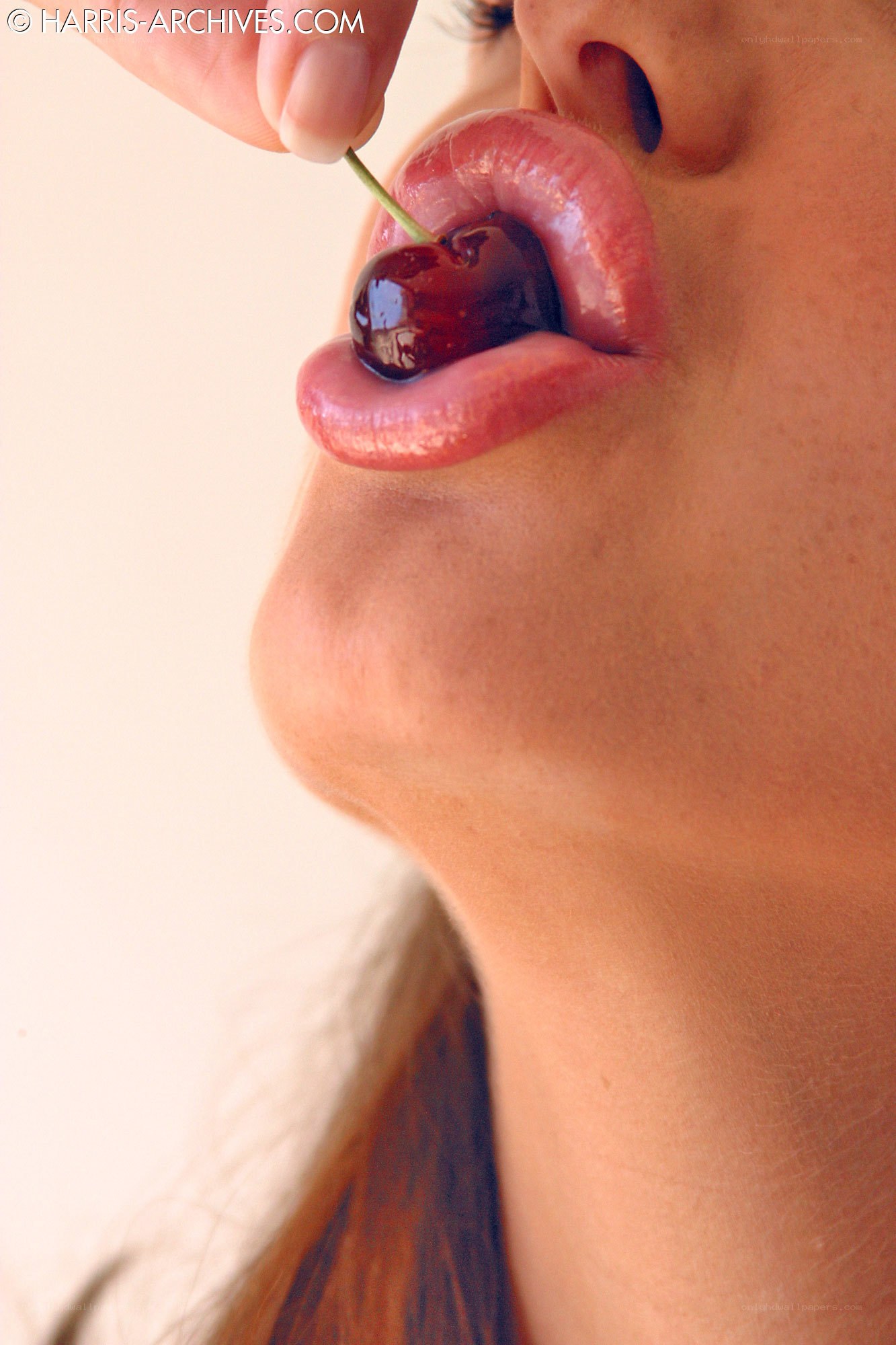 woman eating a cherry