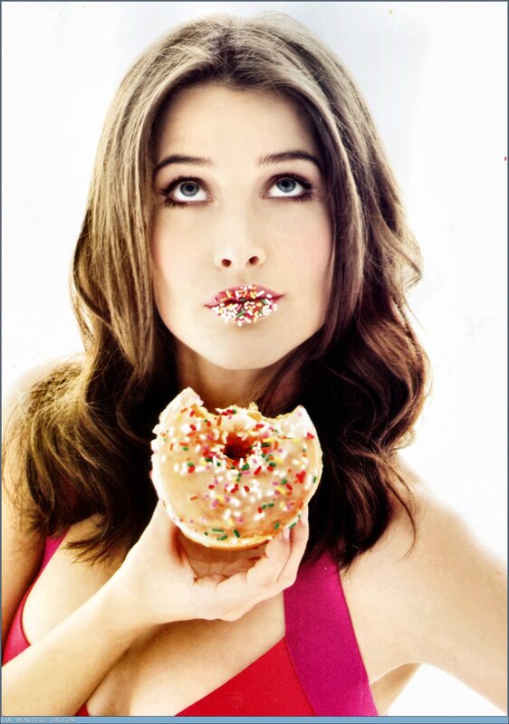 woman eating a donut