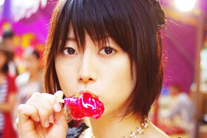 woman eating a lollipop