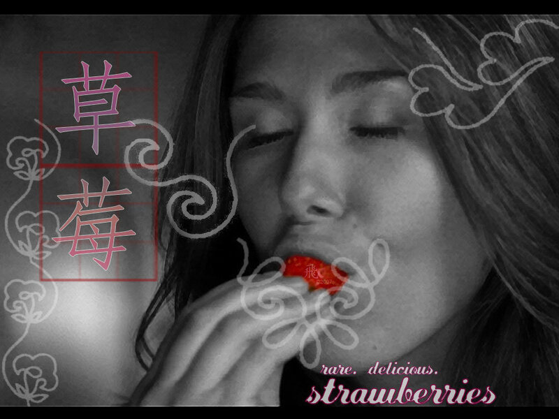 woman eating a strawberry