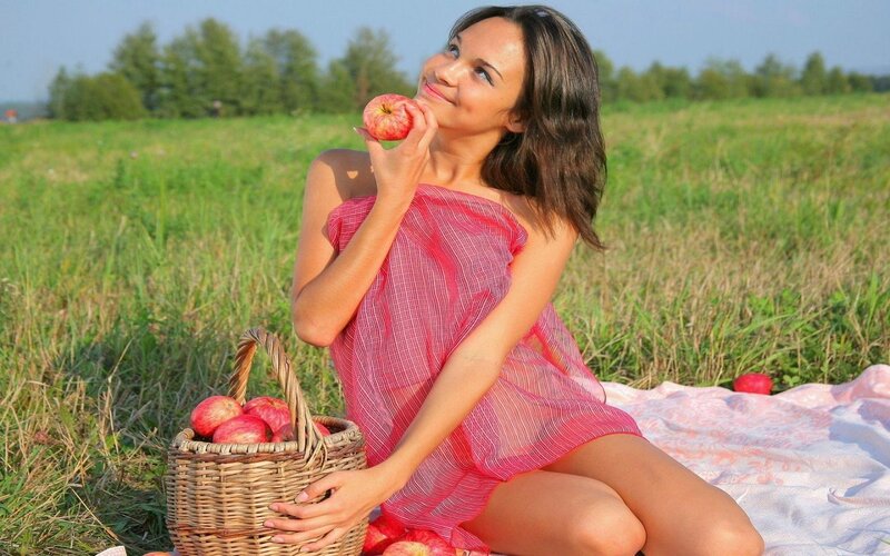 Woman Eating Apple — Red