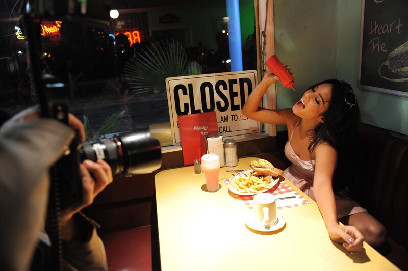 Woman eating at a diner