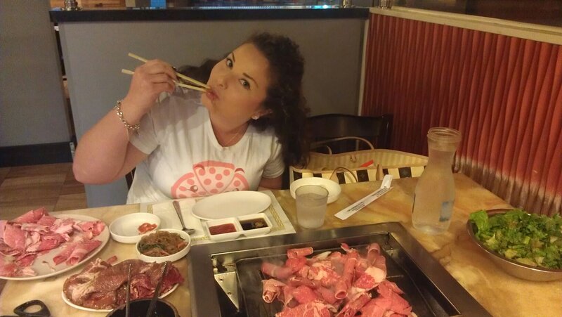 Woman Eating at Grill