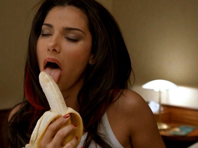 woman eating banana