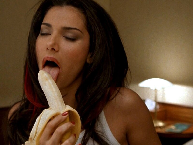 woman eating banana