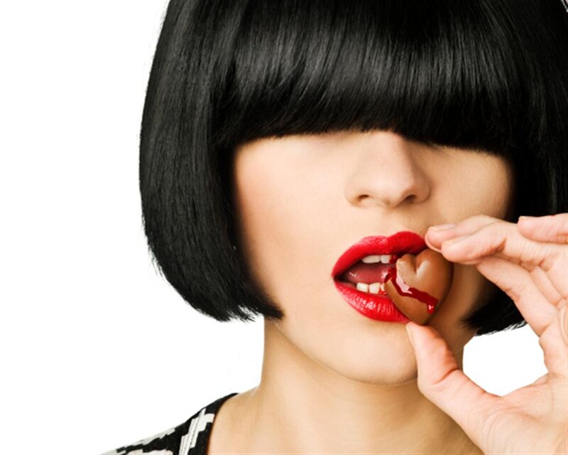 Woman Eating Chocolate — Black