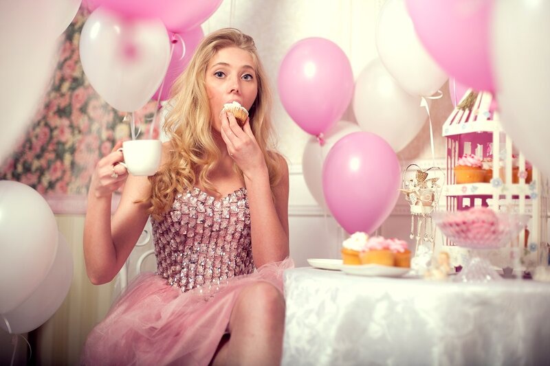 Woman Eating Cupcake — Pink