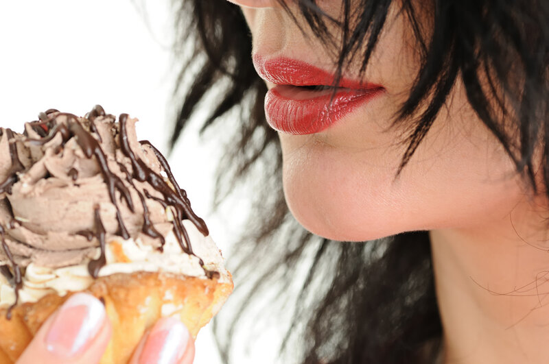 Woman Eating Dessert — Brown