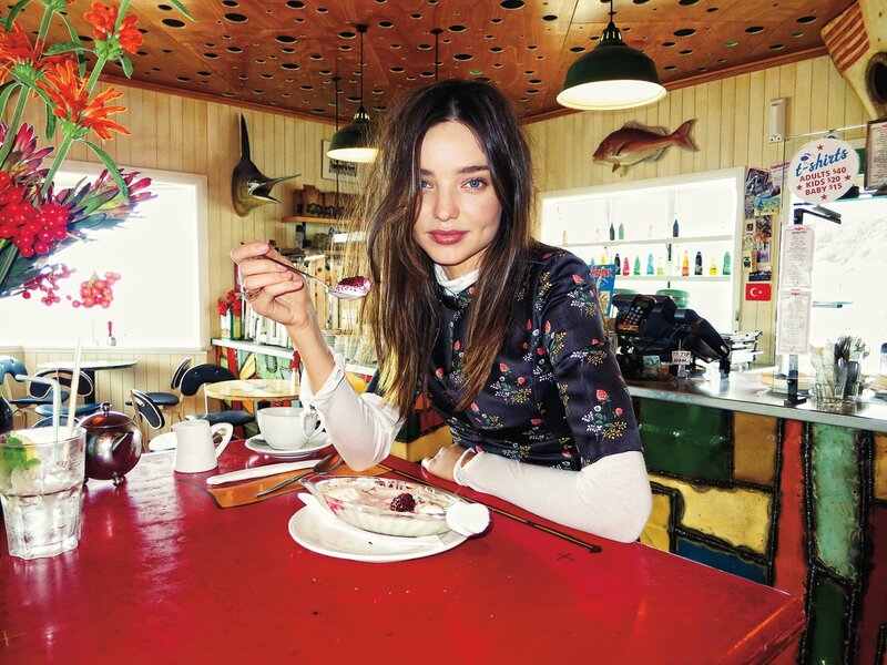 Woman eating dessert in a cafe