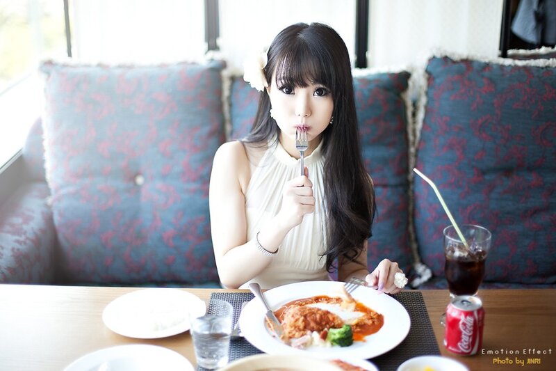 woman eating dinner at restaurant