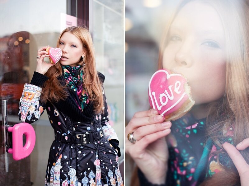 Woman Eating Heart-shaped Pastry