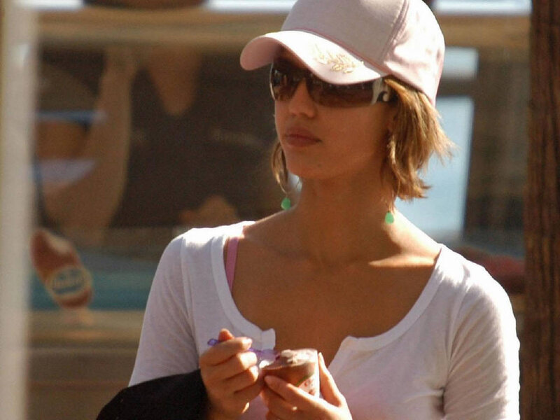 Woman Eating Ice Cream — White