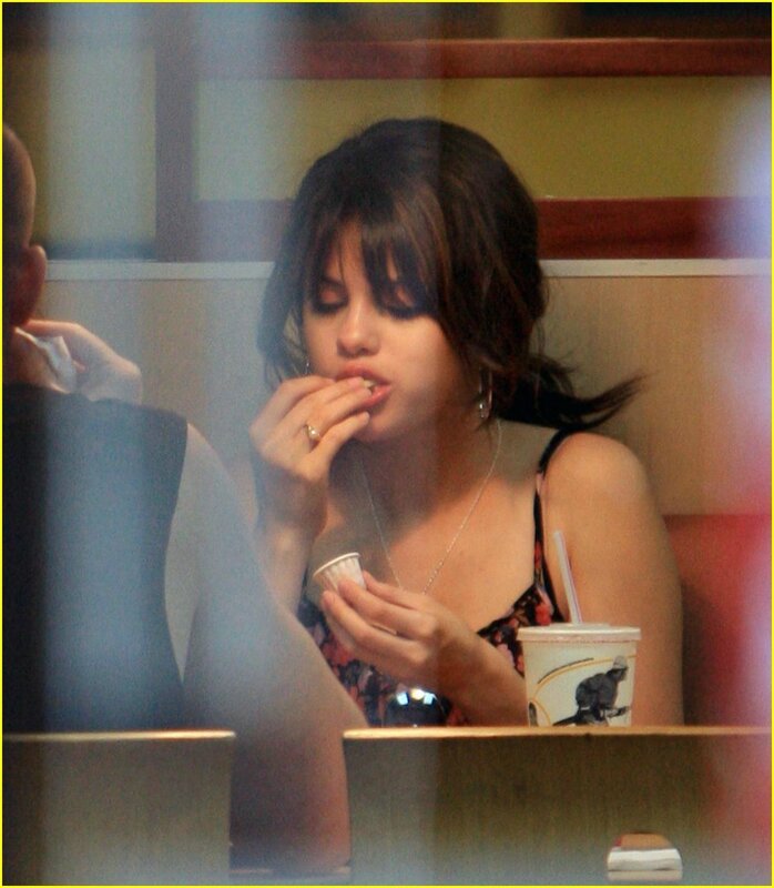 woman eating in a restaurant