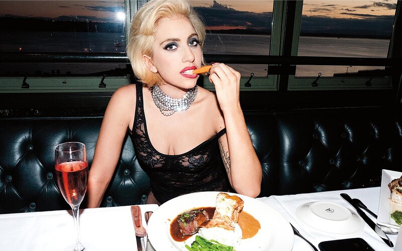 Woman Eating in Restaurant