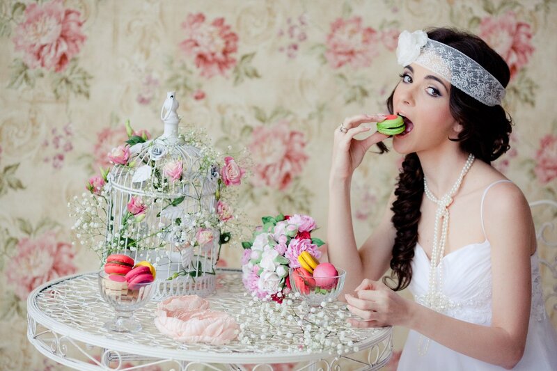 Woman Eating Macarons — White