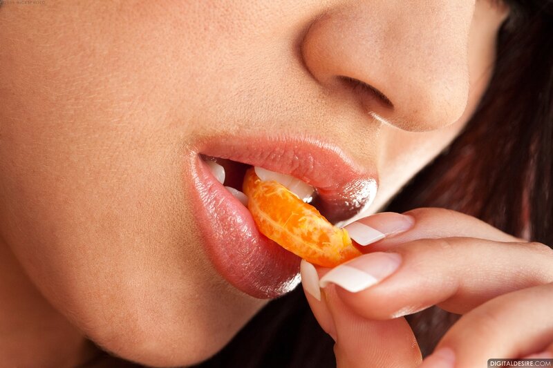 Woman Eating Orange — Neutral