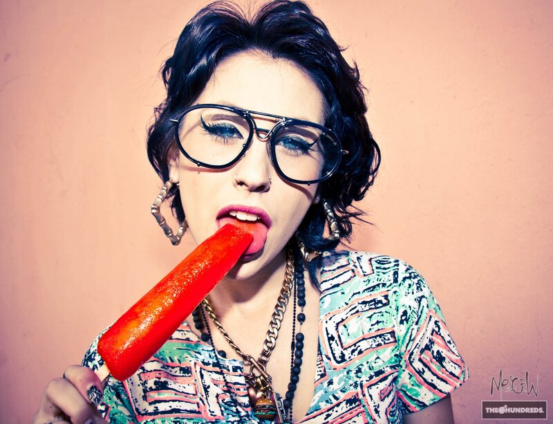 Woman Eating Popsicle — Red, Playful