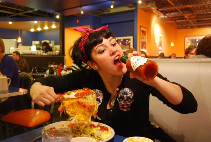 woman eating spicy food