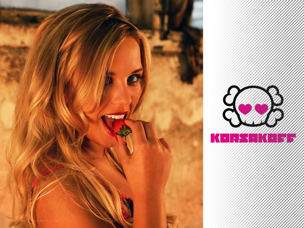 woman eating strawberry