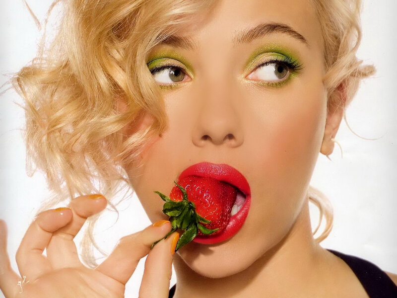 Woman Eating Strawberry — Blonde
