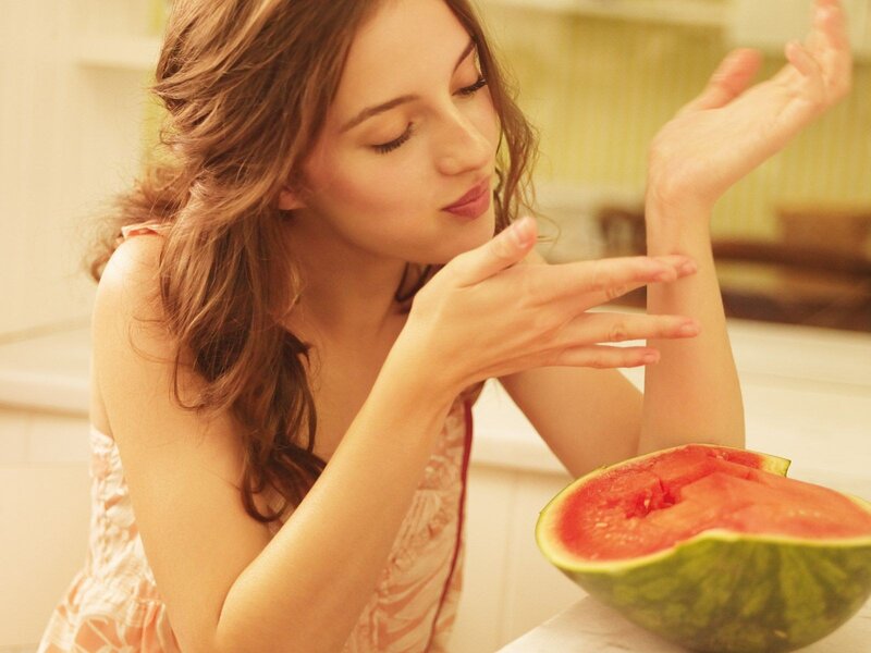 woman eating watermelon