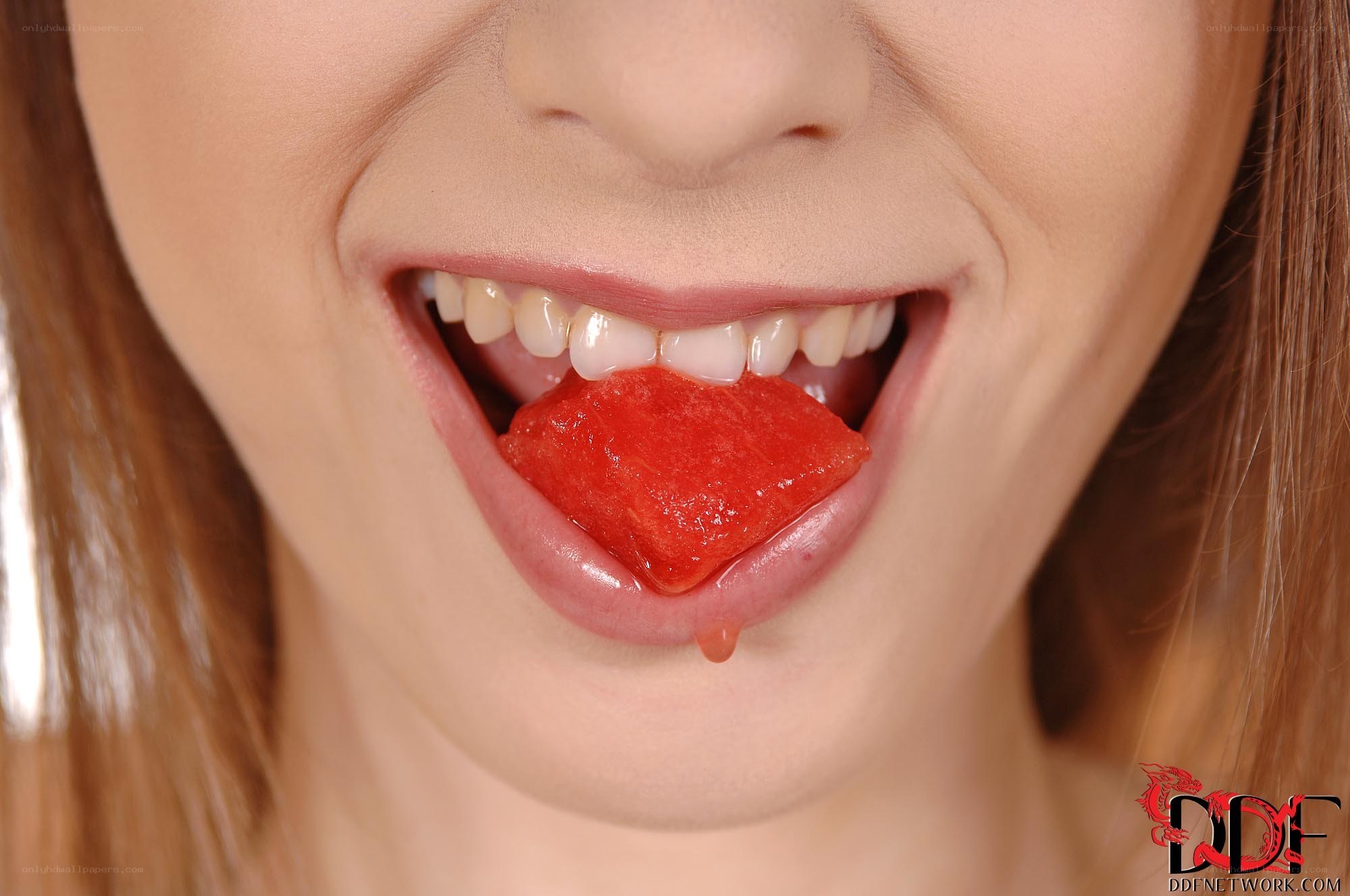 woman eating watermelon