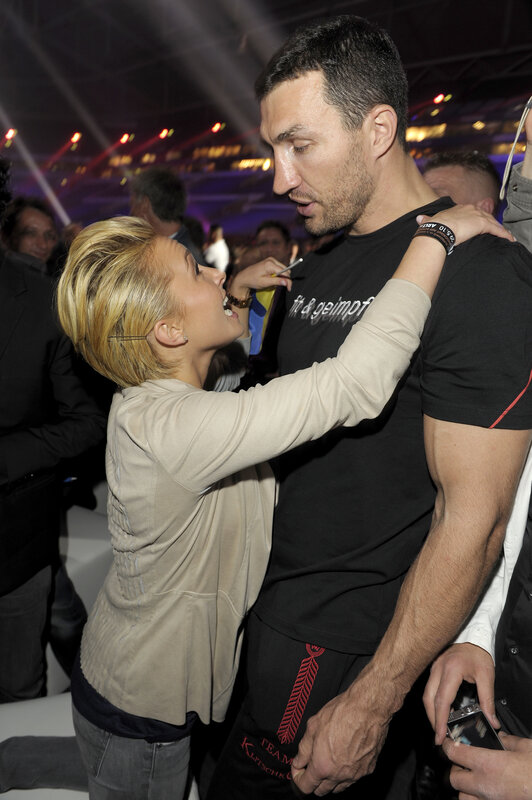 woman embracing man at event