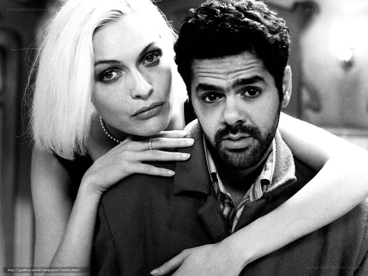 woman embracing man in black and white