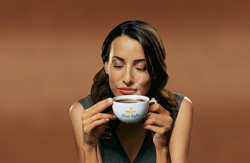 woman enjoying coffee cup