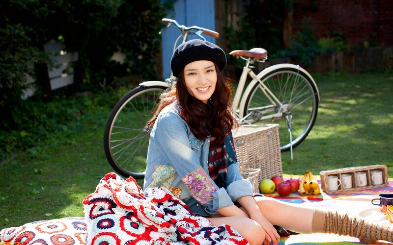 Woman enjoying picnic outdoors