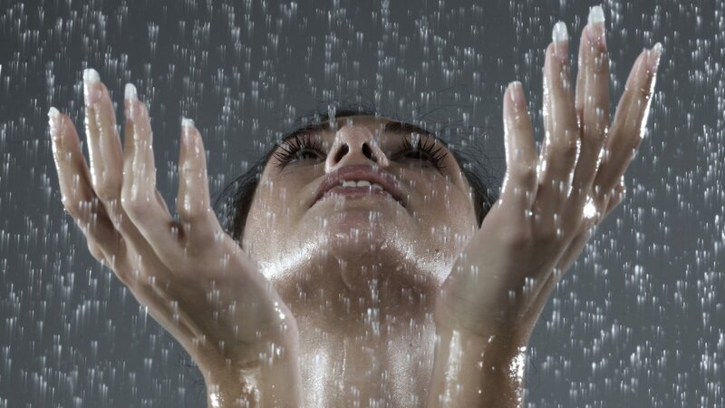 woman enjoying shower water