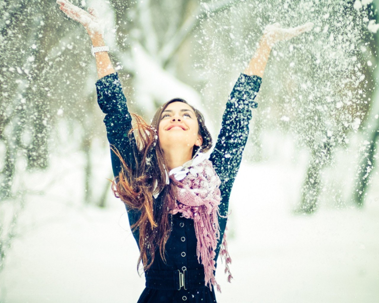 woman enjoying snowfall