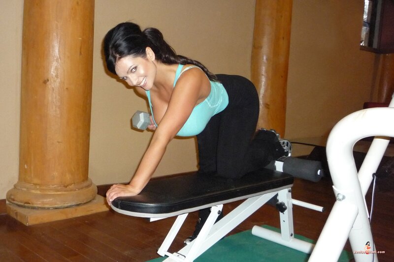 woman exercising with dumbbell