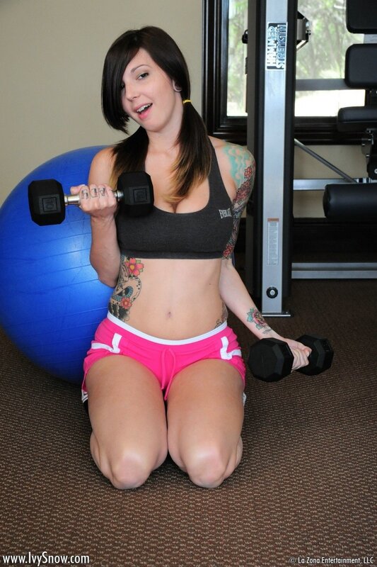 woman exercising with dumbbells