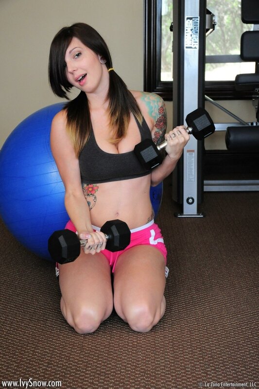 woman exercising with dumbbells