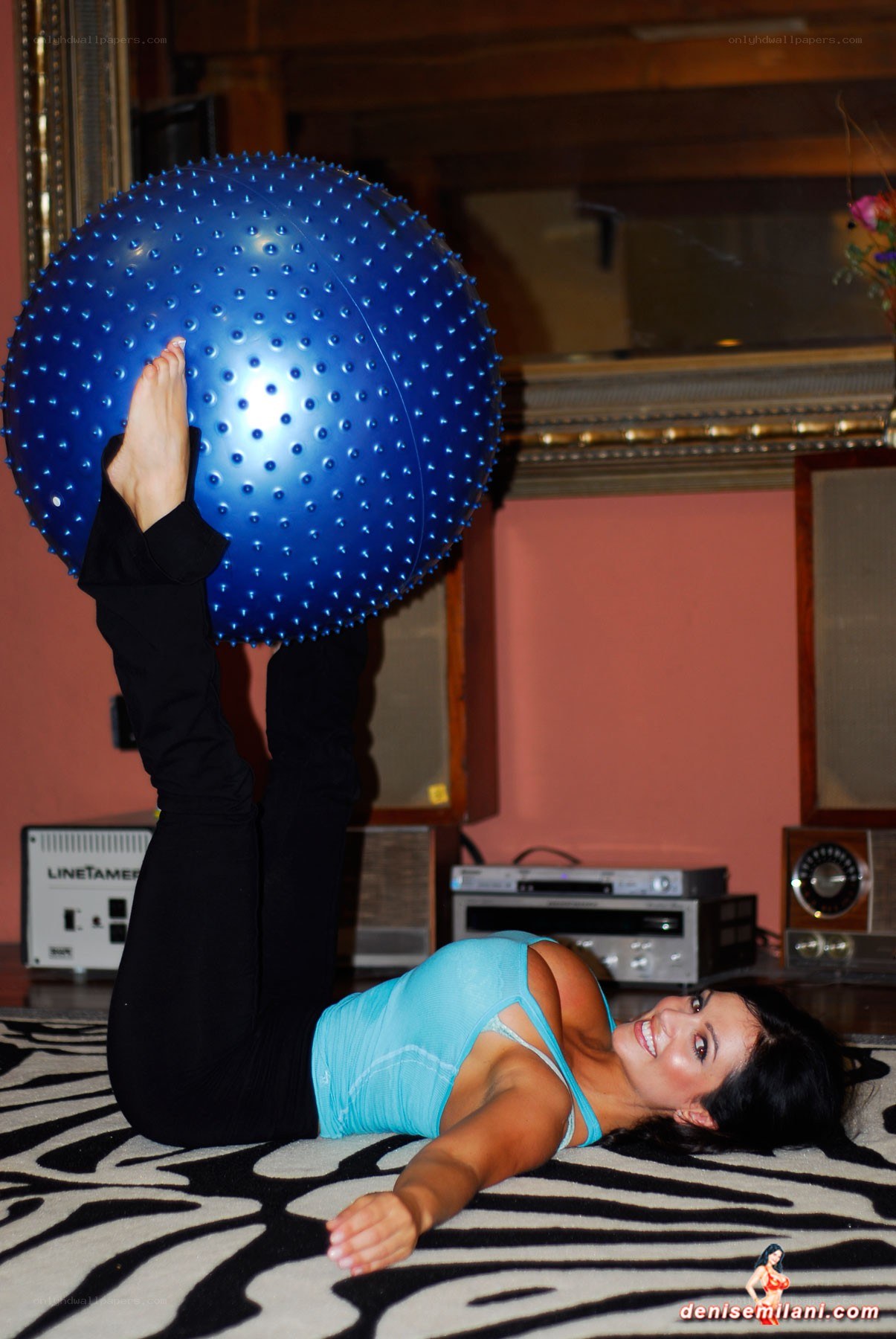 woman exercising with stability ball