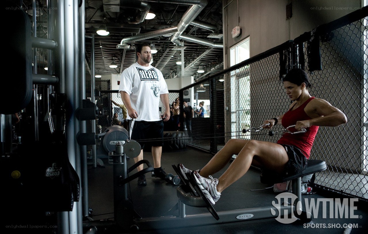 woman exercising with trainer