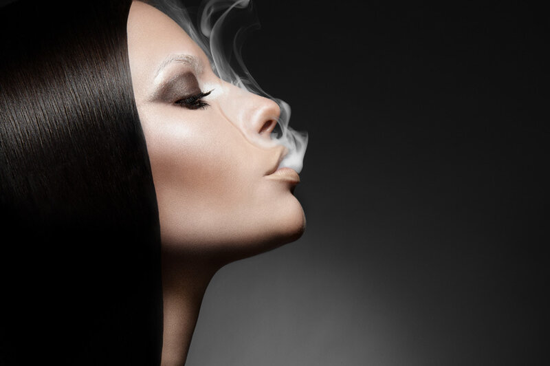 Woman Exhaling Smoke — Black