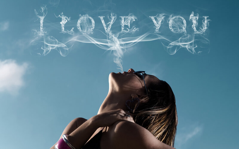 Woman Exhaling Smoke — Blue