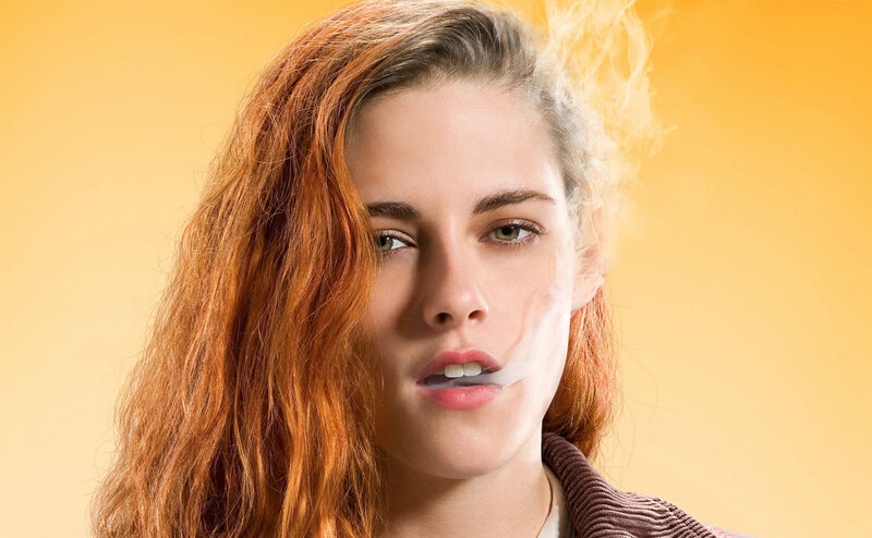 woman exhaling smoke