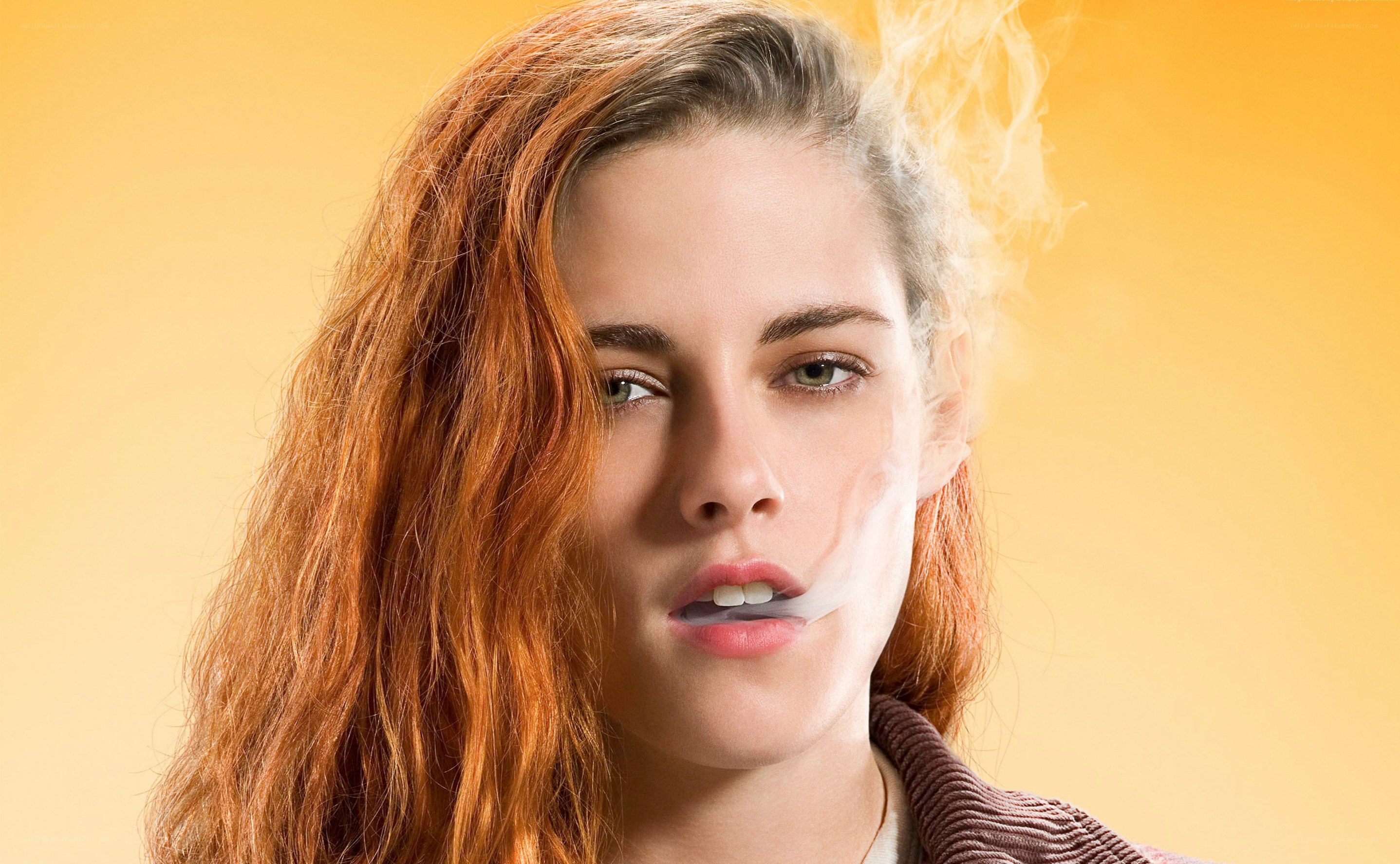 woman exhaling smoke
