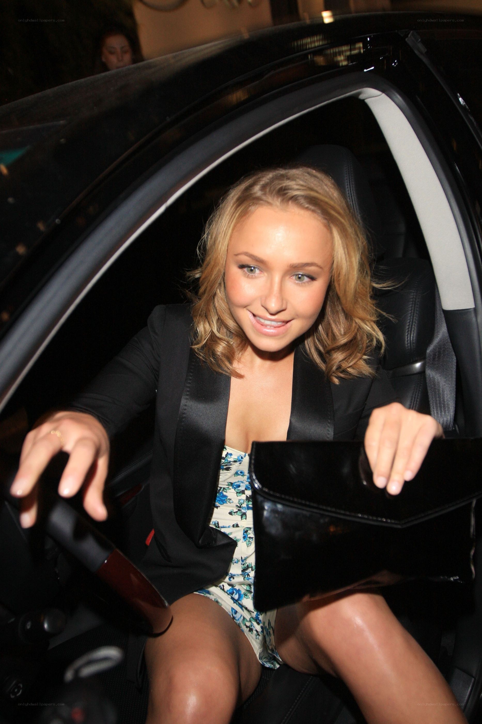woman exiting a car