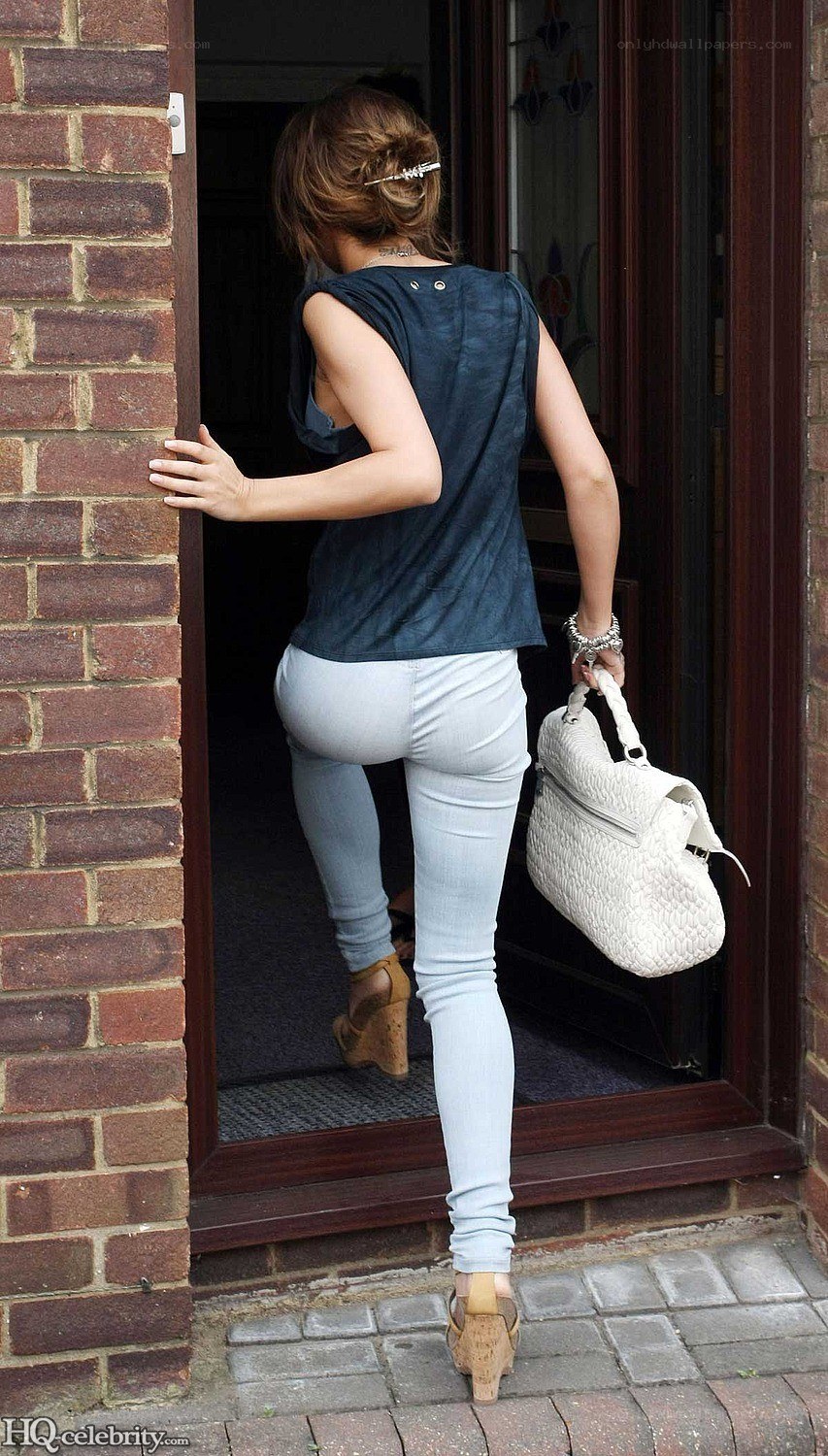 woman exiting a house
